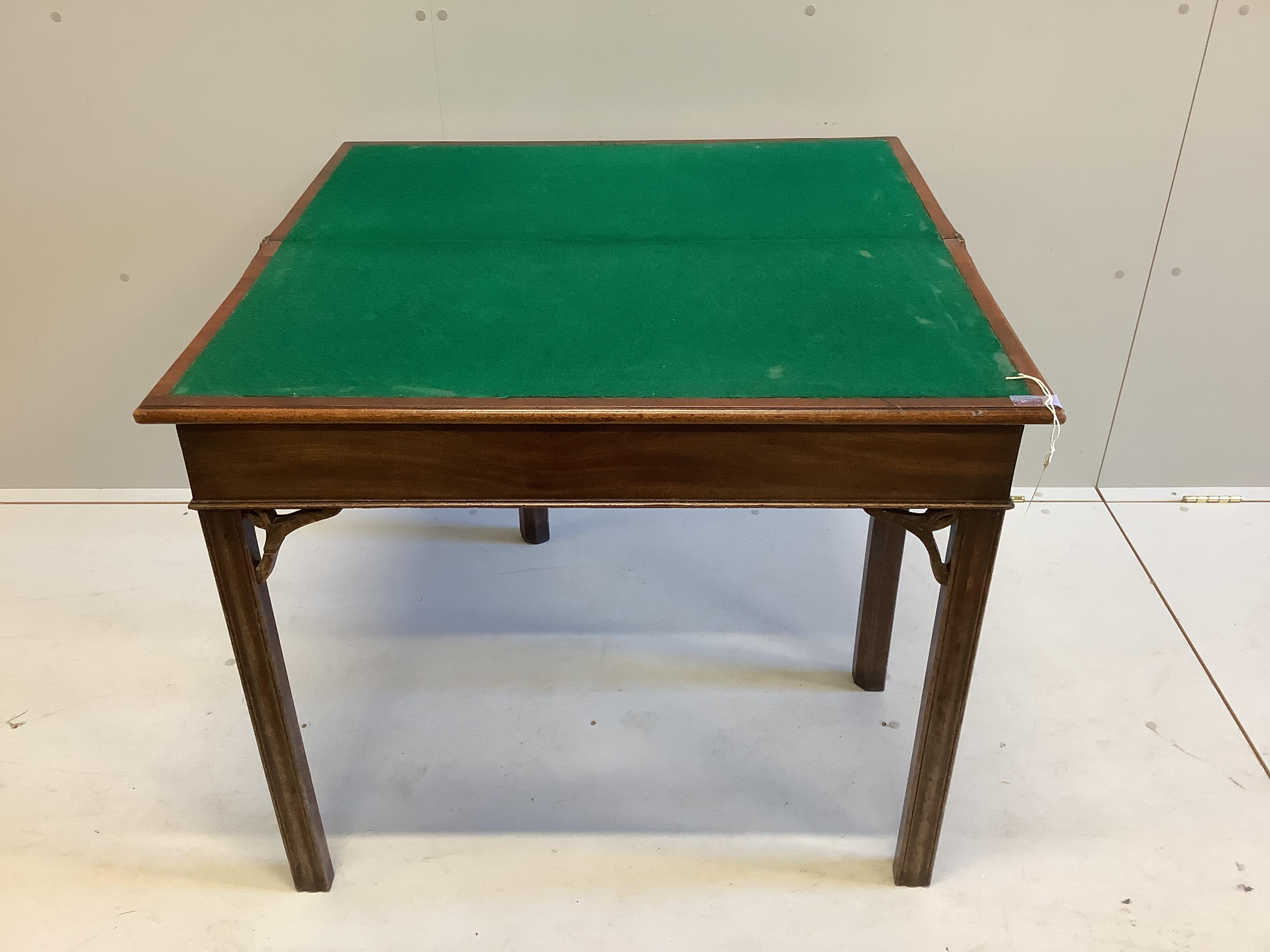 A George III rectangular mahogany folding card table, width 89cm, depth 44cm, height 74cm